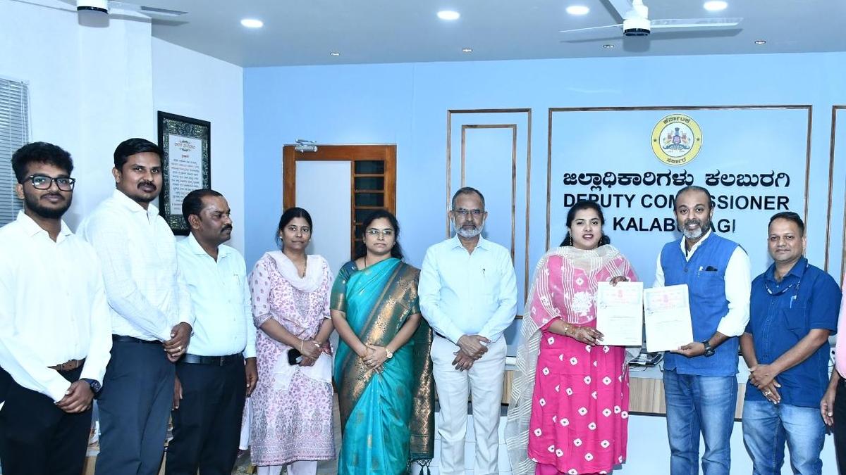 Kalaburagi Deputy Commissioner B. Fouzia Taranum and Sai Krishnan G., general manager of The Hindu Group’s STEP Division, holding the signed MoU with district officials at the Deputy Commissioner’s office in Kalaburagi.